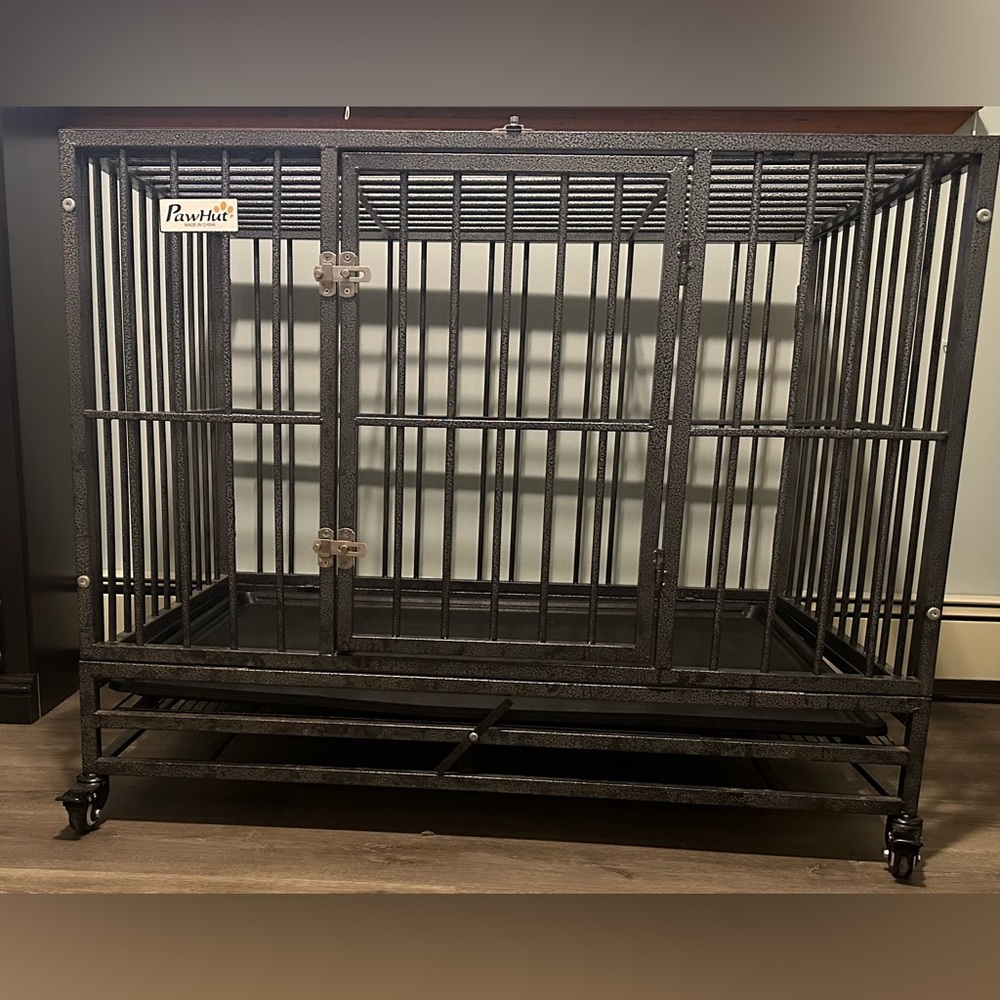 Grey Pawhut heavy duty dog kennel.